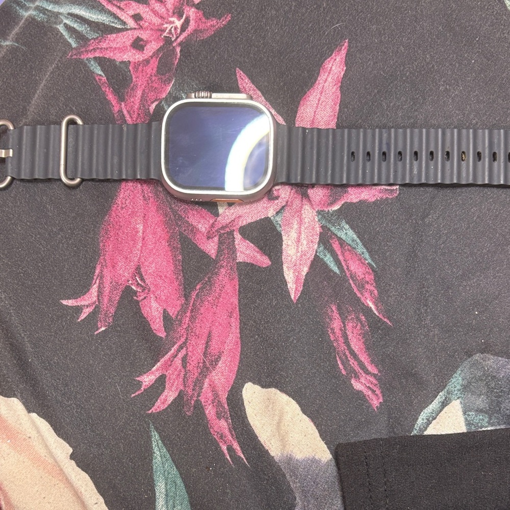 Apple Smartwatch with Black Strap and Silver Case
